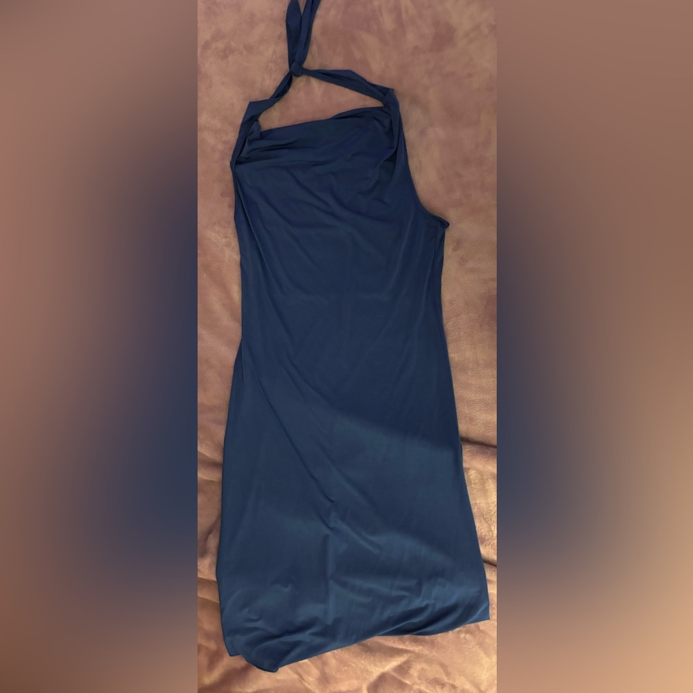Blue high scoop neck, low back dress.